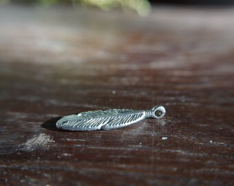Silver feather pendant