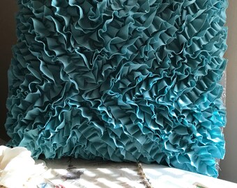 Blue ruffle decorative pillow