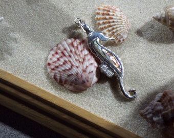Silver seahorse with abalone inlay