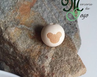Wood bead round "mouse head" pattern. Diameter 2 cm.