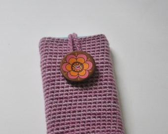 Pink crochet cell phone cozy with large flower button