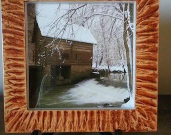 Shadowbox frame vinegar painted in coppery sienna