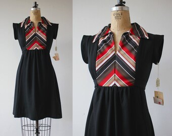 vintage 1970s dress / 70s black dress / 70s empire waist dress / 70s day dress / 70s tie back dress / 70s chevron bib dress / medium large