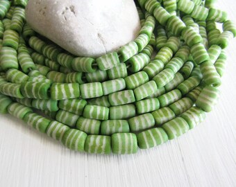 green tube bone beads, with striped carved designs, natural Irregular look, boho rustic exotic beads 8 to 11mm long (16 beads) 6db14-3