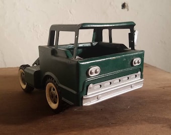 Vintage green structo truck