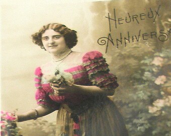 1900s French postcard, Lady with flowers. RPPC real photo postcard, paper ephemera