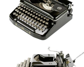 Erika 8 - working typewriter in excellent condition - 50s - portable - vintage typewriter with glass keys