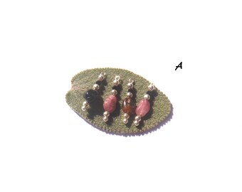 Spinel and tourmaline: 4 microphone charms 2 cm high x 5 mm in diameter