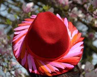 Red woolfelt fedora with feathers
