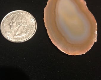 Brown agate slice drilled