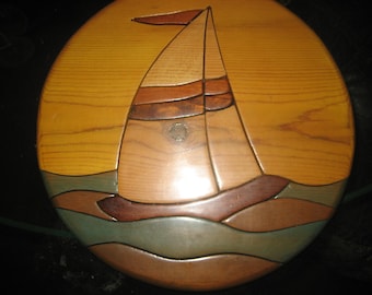Five shades of stain Round Wood Sailboat wall hanging
