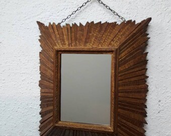 Carved wooden mirror.