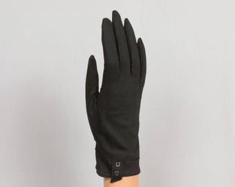 1960s Black gloves Cuff is cut at an angle Decorated cuff Placket on the palm Sz Small - medium, Excellent condition Pristine