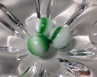Agate marbles white and green.