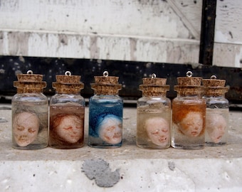Miniature head in a jar Goth pendant Weird stuff witch jewelry Creepy jewelry Terrarium jewelry Doll head necklace Shrunken head Odd gift