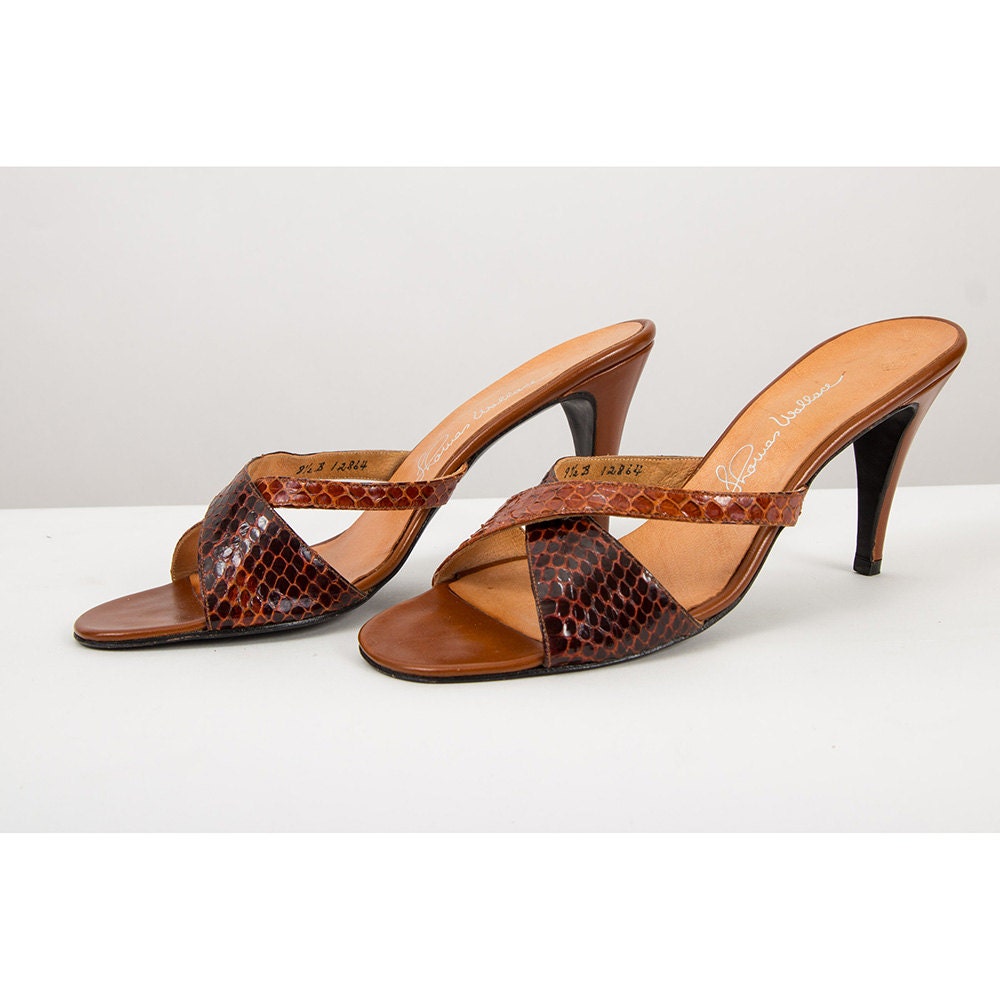 snakeskin heeled mules