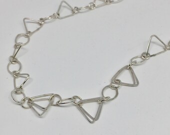 With geometric links sterling silver chain