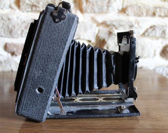 Antique Camera. Folding antique camera with case.