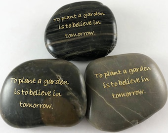 To plant a garden is to believe in tomorrow - Set of 3 Engraved River Rocks