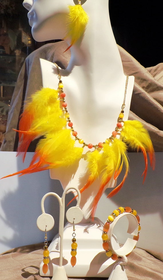 Yellow Bird..... feather and beaded jewelry suite