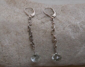 Genuine Tsavorite garnet drips from sterling silver
