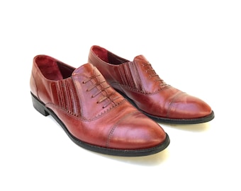Vintage 1980s women’s ‘Torretti’ rich oxblood leather slip on shoes with elastic sides and detailing