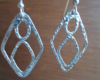 Sterling silver ( .925 ) dangling earrings.