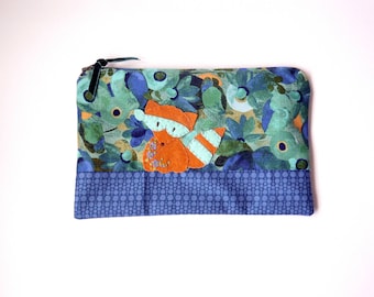 Zipper Pouch, 5.75x9" in blue, green, navy and brown floral print fabric with Handmade Felt Raccoon Embellishment, Raccoon Zipper Pouch