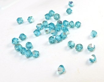 Swarovski Crystal Bicones, 24 Light Turquoise Blue AB Swarovski 4mm Bicones, 4mm Crystal Bicones, Item 132B