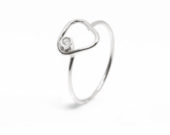 Platinum thread ring with Júdez and Serena Diamond