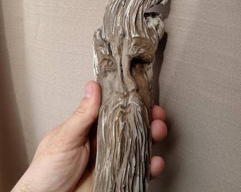 Spirit face hand carved in driftwood