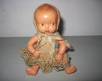 Vintage Irwin Baby Doll with moveable arms and legs crochet dress
