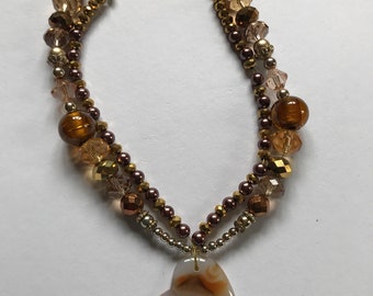 Gold and bronze beaded heart necklace