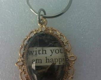 Handmade KC Plated Gold Oval Key Chain Pendant with Up cycled Book Poetry “With You I Am Happy”