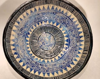 Blue and black decorated bowl