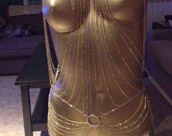 Gold and silver coloured top.