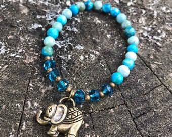 Blue Jasper bracelet with glass bead accents and elephant charm