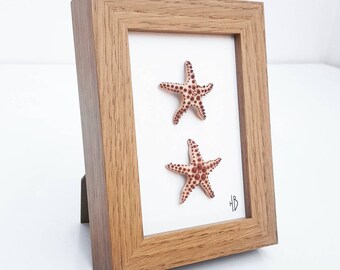 Two Handmade Ceramic Starfish in a Wooden Frame