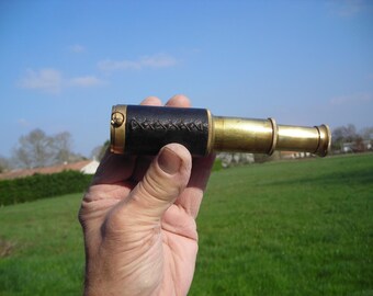 Vintage brass telescope. Maritime Telescope