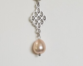 Pink freshwater pearl on silver charm in 16 inch chain