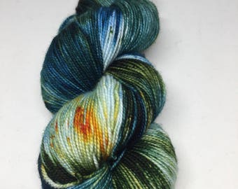 Hand dyed sock yarn in teal, dark green and blues. Super wash Marino and nylon sock yarn inspired by Canyon Lake. Sock yarn hand dyed