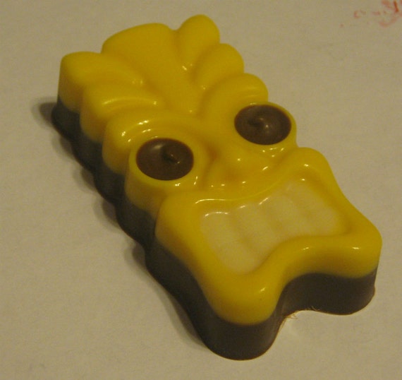One dozen tiki mask chocolate covered sandwich cookie party favors