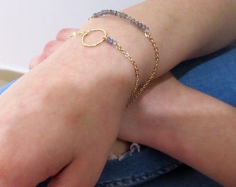 A goldfilled bracelet with a hammered loop and stunning labradorite gemstones