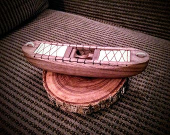 Wooden whitewater solo canoe