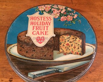 Rare- 1920's Lithographed Hostess Holiday fruitcake tin- UBC
