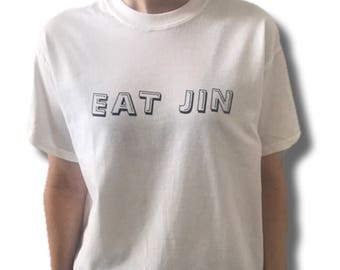 jin with white shirt