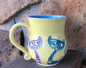 Slip Trailed Yellow cat mug wheel thrown pottery