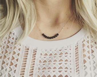 essential oil necklace, lava rock necklace in black, nine lava beads, delicate modern jewelry