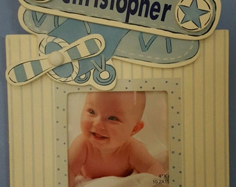 Sweet personalized airplane picture frame and hook. Customize with your child's name. Holds 4 x 4 picture. Airplane themed. New baby.