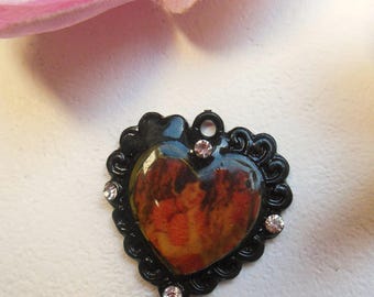 pretty black heart shaped charm